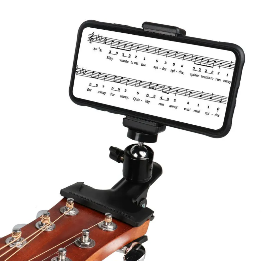 Guitar Phone Holder clipped to a guitar headstock
