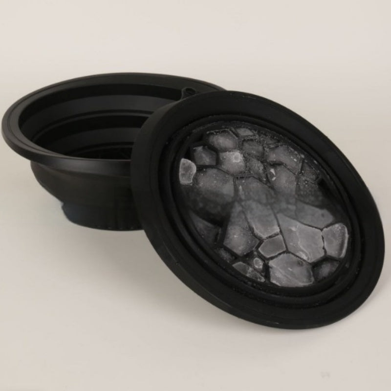 Collapsible Silicone Ice Basin filled with ice for a facial